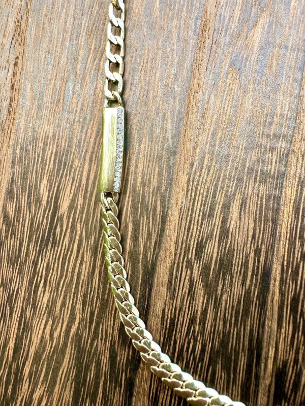 MN-23319-LTAG_CURB CHAIN WITH DBL BAR NECKLACE_(FW24)_A Double Bar Curb Chain Necklace